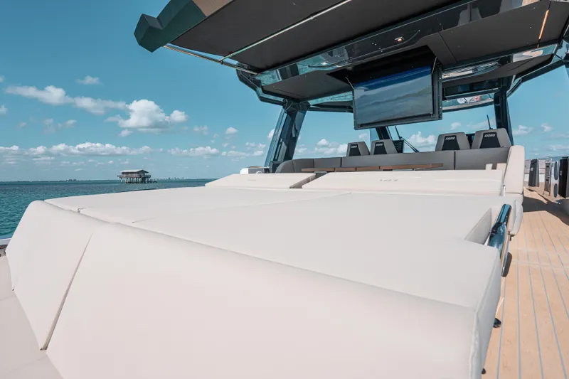 Slide: The Image of Luxurious 2026 Fjord 490 SPORT yacht with spacious deck and modern seating. - 17