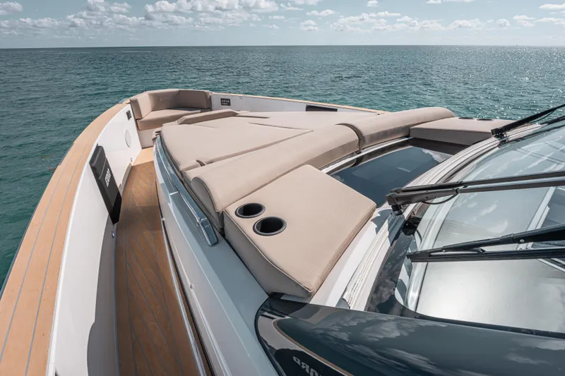 Slide: The Image of 2026 Fjord 490 SPORT luxury yacht with sunbathing deck on open sea. - 24