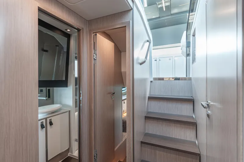 Slide: The Image of Interior of 2026 Fjord 490 SPORT yacht, featuring modern design and wooden finishes. - 30