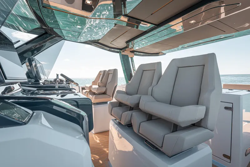 Slide: The Image of Luxurious 2026 Fjord 490 SPORT yacht interior with modern seating and sleek design. - 33