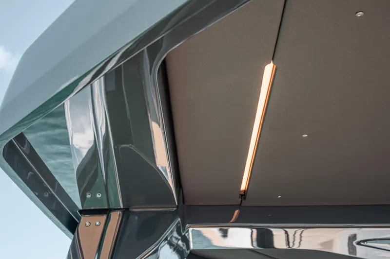 Slide: The Image of Fjord 490 SPORT 2026 boat interior with sleek modern design and lighting. - 25