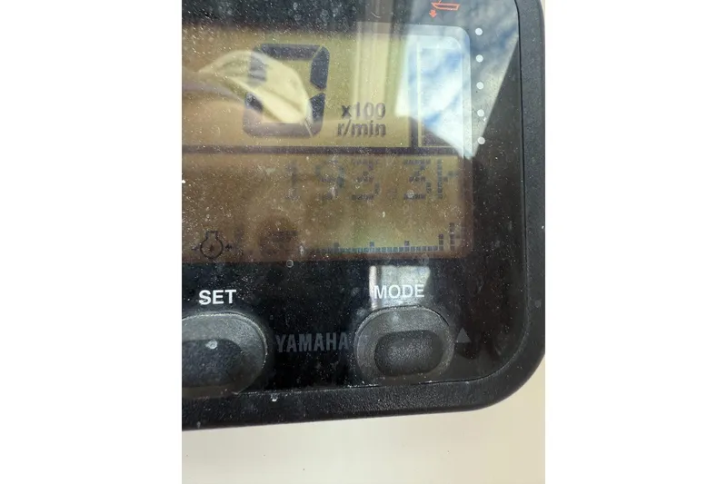 Slide: The Image of Yamaha boat control panel on a 2010 Parker 2510 XL Walkaround. - 9