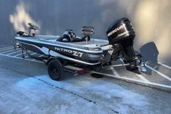 Slide: The Image of 2008 Nitro Z-7 boat with Mercury engine parked on a trailer. - 4