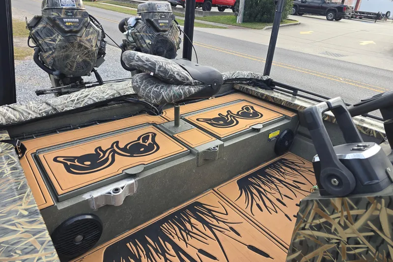 Slide: The Image of 2023 Go-Devil 2072 boat interior with camouflage design and dual engines. - 15