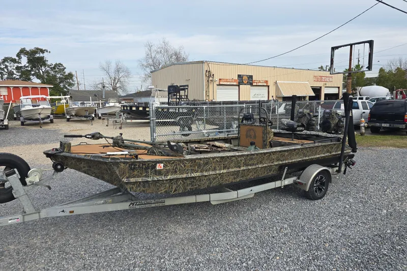 Slide: The Image of Go-Devil 2072 boat on trailer, 2023 model, parked outdoors. - 16
