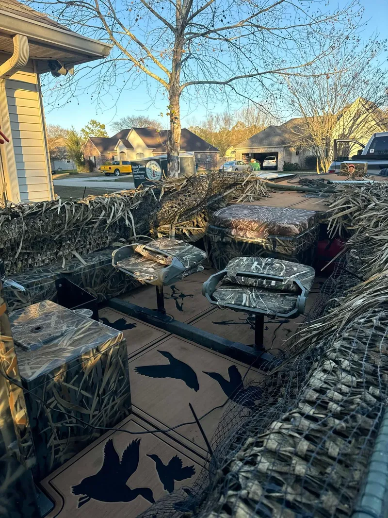 Slide: The Image of 2023 Go-Devil 2072 boat with camouflage interior and duck-themed decor. - 8