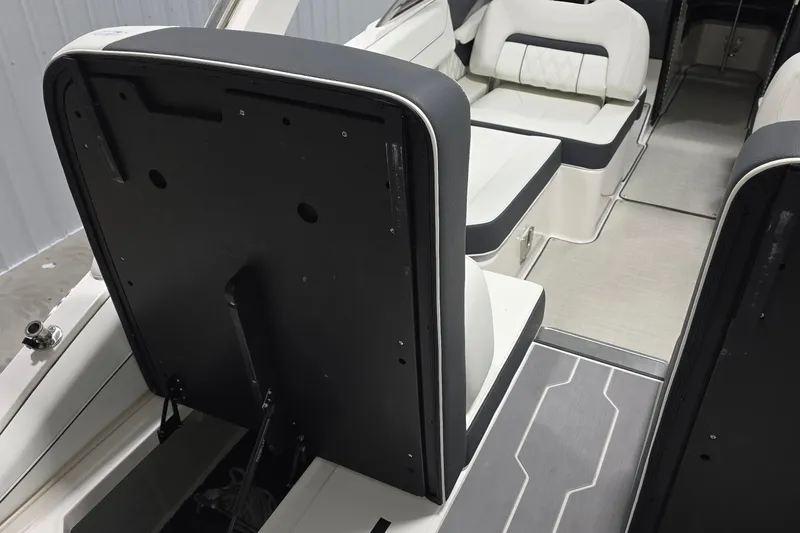 Slide: The Image of 2023 Regal LS4 boat interior with sleek seating and modern design elements. - 18