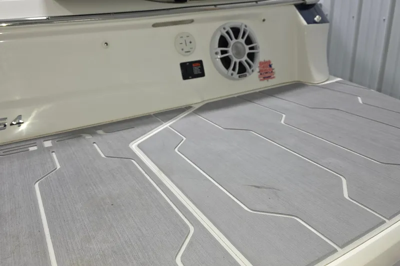 Slide: The Image of 2023 Regal LS4 boat deck with speaker and control panel. - 20