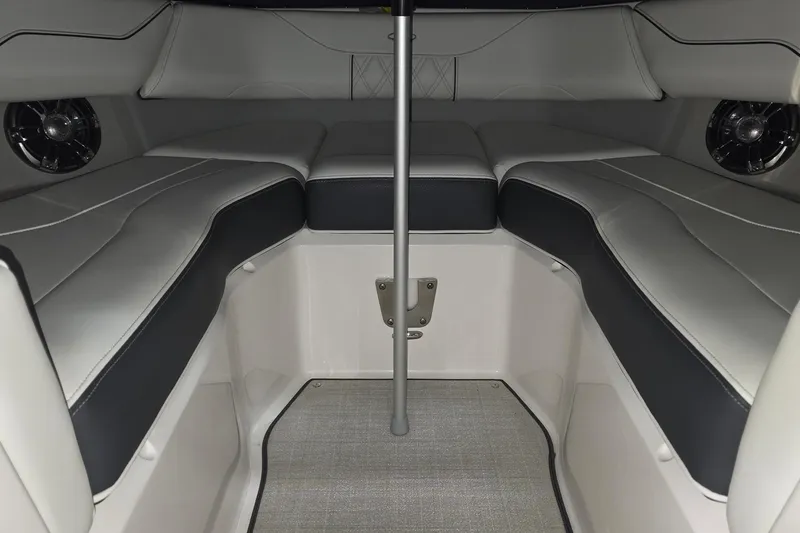 Slide: The Image of 2023 Regal LS4 boat interior with cushioned seating and modern design. - 21