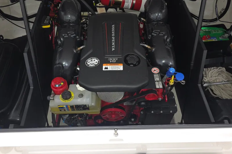 Slide: The Image of 2023 Regal LS4 engine compartment featuring a Volvo Penta 300 V8 engine. - 30