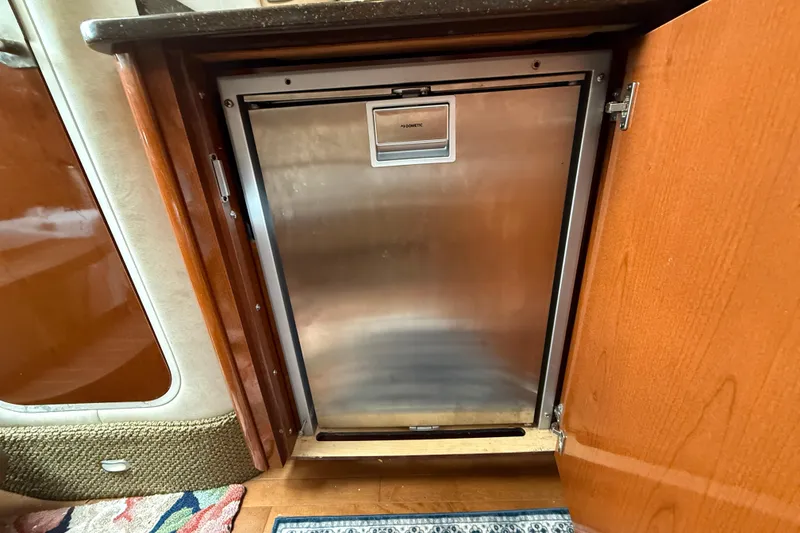 Slide: The Image of Stainless steel refrigerator in 2012 Sea Ray 370 Sundancer yacht interior. - 23