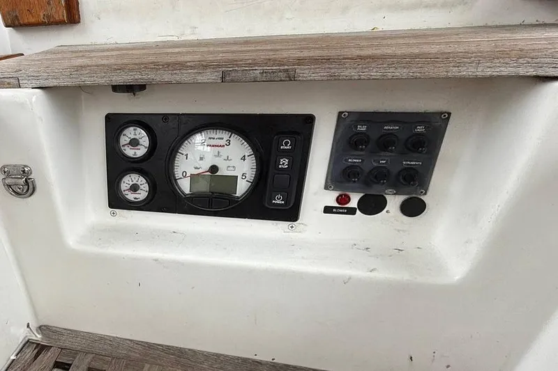 Slide: The Image of Control panel of a 1984 Morgan 384 sailboat with gauges and switches. - 44