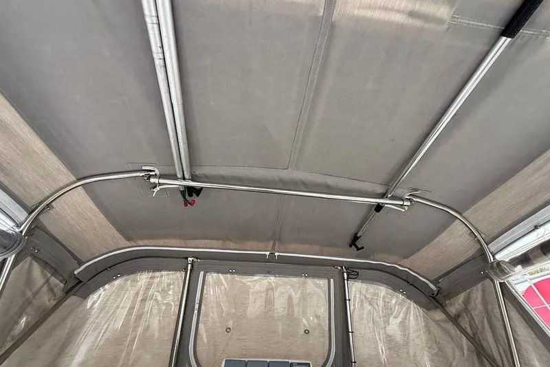 Slide: The Image of Interior view of a 1984 Morgan 384 sailboat canopy with metal frame and fabric cover. - 48