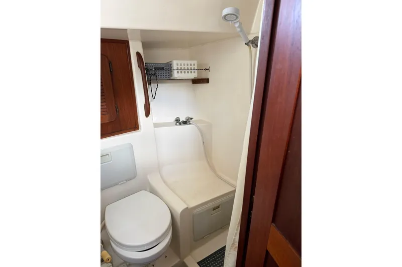 Slide: The Image of Compact bathroom in 1984 Morgan 384 yacht with shower and toilet. - 57