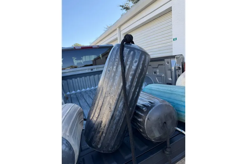 Slide: The Image of Boat fenders in a truck bed, Morgan 384, 1984 model. - 77