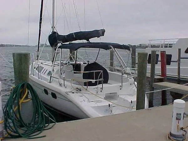 The Image of 2000 Hunter 380 sailboat docked at marina. - 0