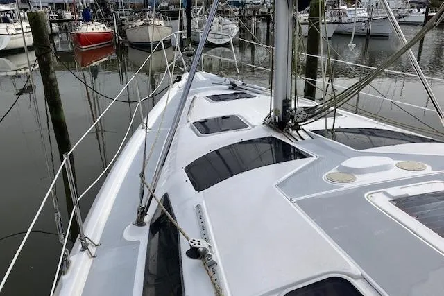 Slide: The Image of Sailboat deck view of 2000 Hunter 380 model docked in a marina. - 5
