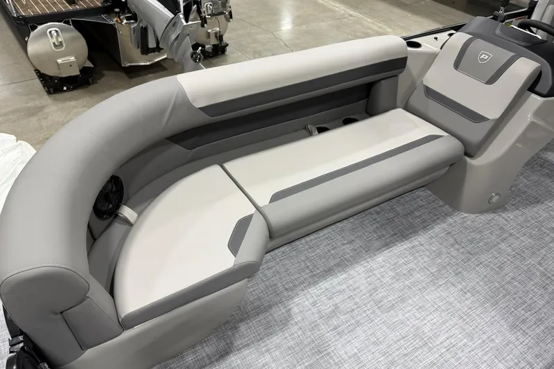 Slide: The Image of 2026 Premier 220 Sunscape RF-CL boat interior with sleek gray seating and modern design. - 5
