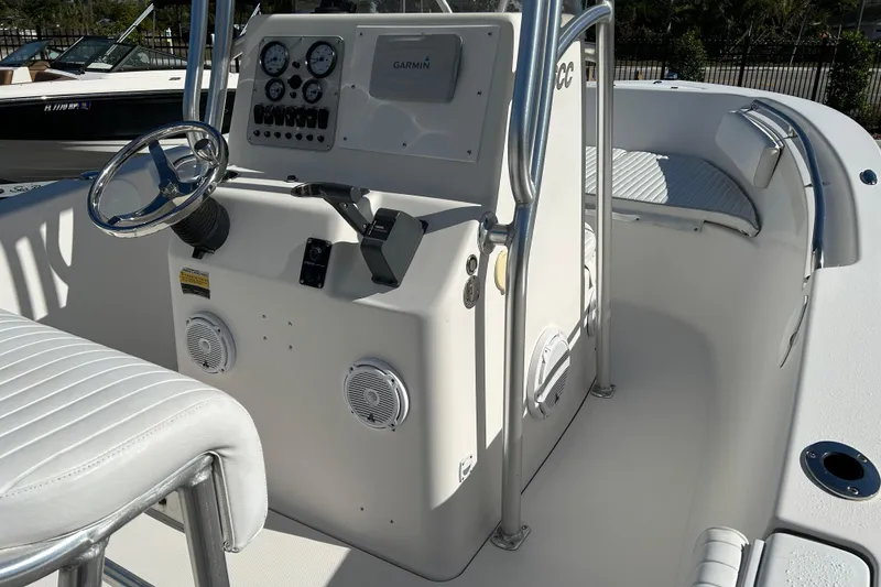 Slide: The Image of 2008 Tidewater 216 CC Adventure boat console with steering wheel and Garmin navigation system. - 10