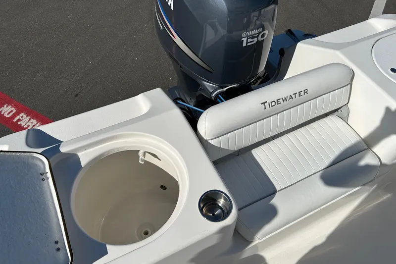 Slide: The Image of 2008 Tidewater 216 CC Adventure boat with Yamaha 150 engine and seating. - 18