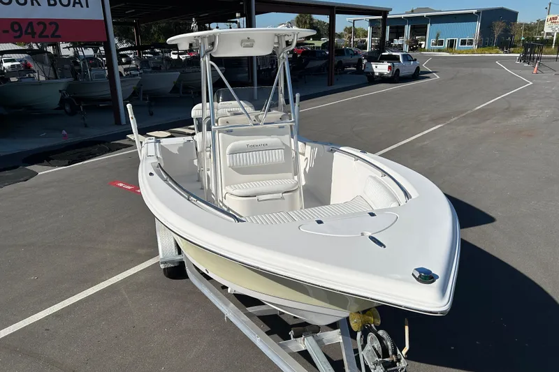 Slide: The Image of 2008 Tidewater 216 CC Adventure boat on trailer in parking lot. - 6