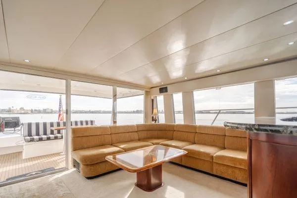 Slide: The Image of Luxurious interior of a 1998 Pacific Mariner 65 yacht with spacious seating and elegant design. - 2