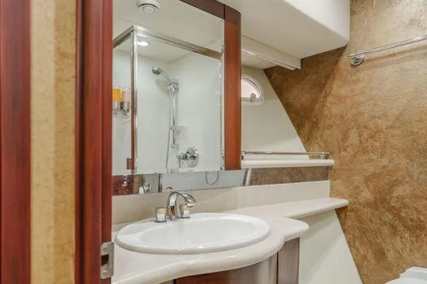 Slide: The Image of Bathroom interior of 1998 Pacific Mariner 65 yacht, featuring sink and shower. - 22