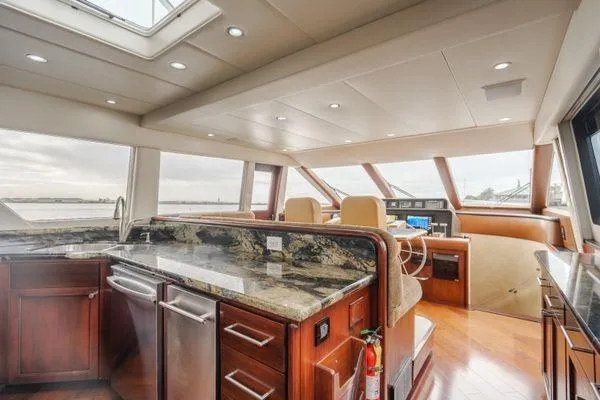 Slide: The Image of Luxurious interior of a 1998 Pacific Mariner 65 yacht with modern kitchen and helm. - 6