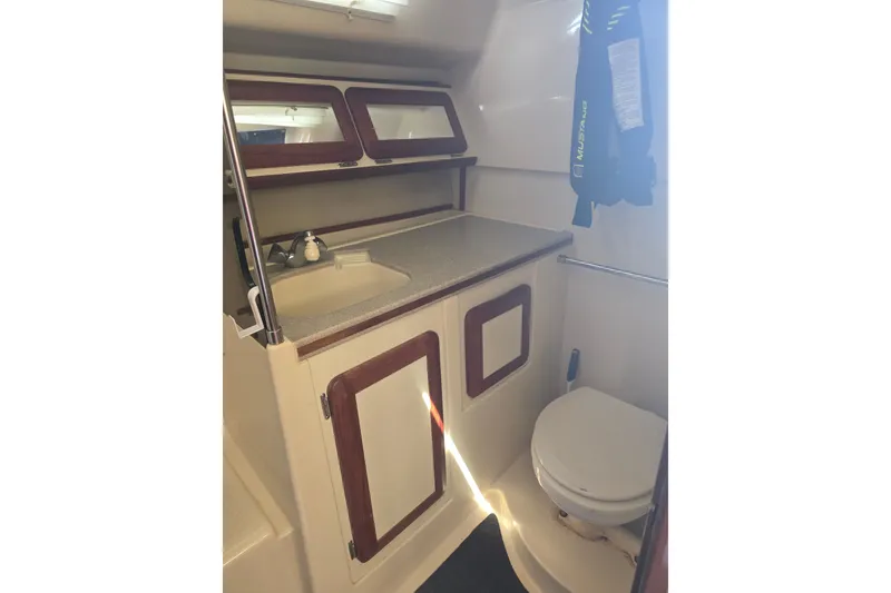 Slide: The Image of Interior of 1993 Hunter Legend 35.5 sailboat bathroom with sink and toilet. - 21