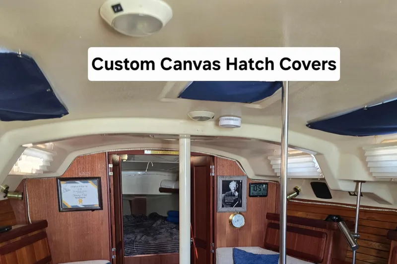 Slide: The Image of Interior of 1993 Hunter Legend 35.5 sailboat with custom canvas hatch covers. - 25