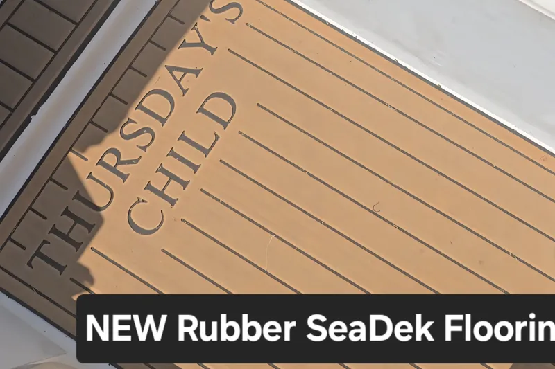 Slide: The Image of New SeaDek flooring on 1993 Hunter Legend 35.5 sailboat, featuring "Thursday's Child" text. - 38