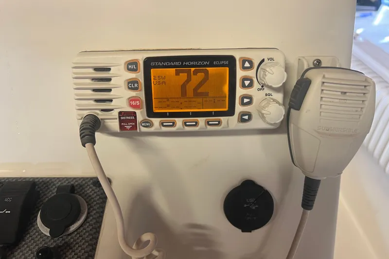 Slide: The Image of Standard Horizon Eclipse radio on 2016 Carolina Skiff 23 Ultra Elite boat dashboard. - 19