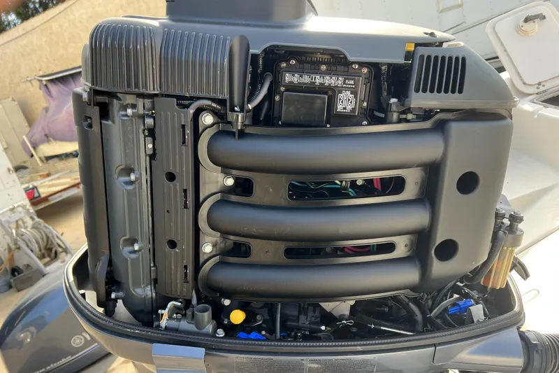 Slide: The Image of 2016 Carolina Skiff 23 Ultra Elite boat engine, detailed view of internal components. - 24