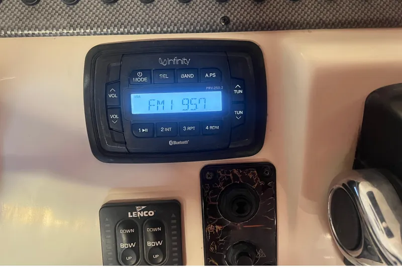 Slide: The Image of Infinity radio on Carolina Skiff 23 Ultra Elite, tuned to FM 95.7. - 36