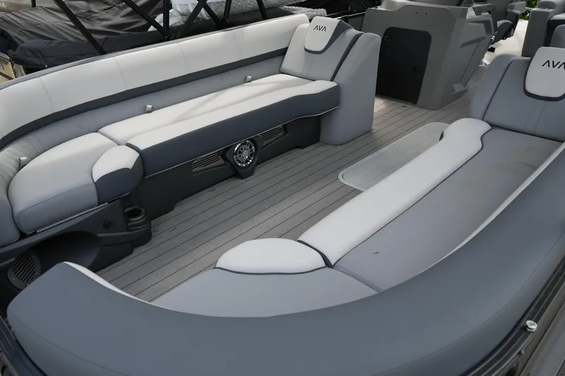 Slide: The Image of Luxurious seating on 2026 Avalon Catalina Cruise Funship, featuring sleek gray and white upholstery. - 11