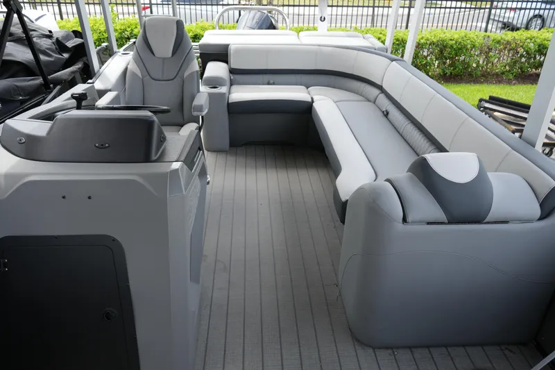 Slide: The Image of 2026 Avalon Catalina Cruise Funship interior with sleek gray seating and modern design. - 16
