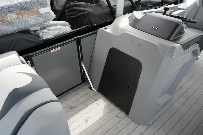 Slide: The Image of Interior view of 2026 Avalon Catalina Cruise Funship, showcasing seating and storage compartments. - 17