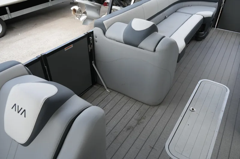 Slide: The Image of Interior of 2026 Avalon Catalina Cruise Funship, featuring gray seating and deck. - 18