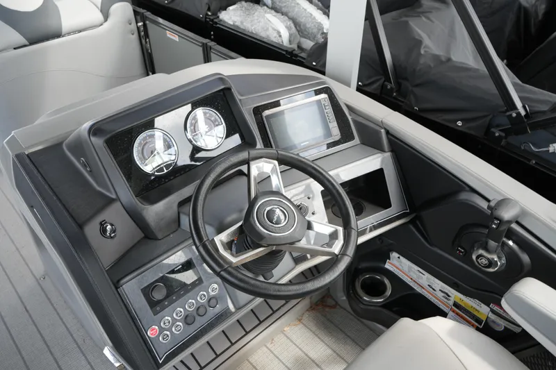 Slide: The Image of Steering console of 2026 Avalon Catalina Cruise Funship, featuring modern controls and gauges. - 20