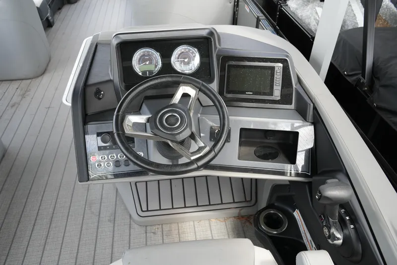Slide: The Image of Steering console of 2026 Avalon Catalina Cruise Funship, featuring modern controls and gauges. - 22