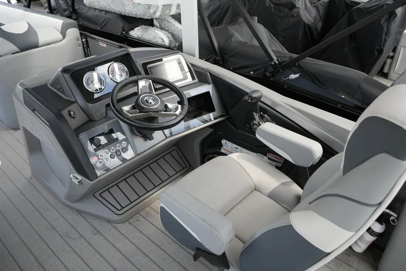 Slide: The Image of 2026 Avalon Catalina Cruise Funship 27' helm with modern controls and comfortable seating. - 27