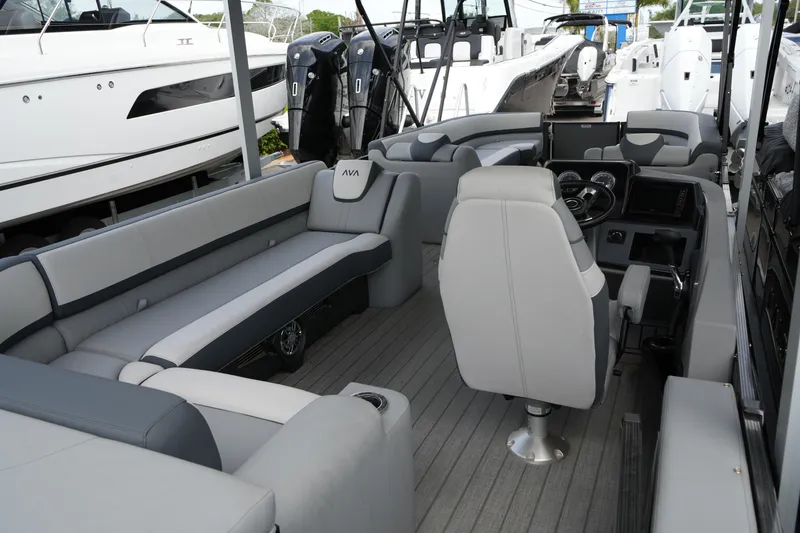 Slide: The Image of 2026 Avalon Catalina Cruise Funship interior with modern seating and steering console. - 31