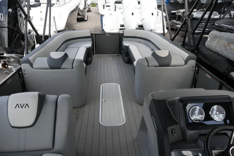 Slide: The Image of 2026 Avalon Catalina Cruise Funship 27' interior with luxurious gray seating and modern dashboard. - 34
