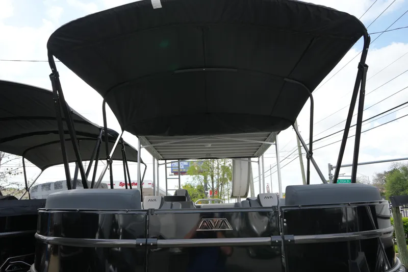 Slide: The Image of 2026 Avalon Catalina Cruise Funship, 27-foot pontoon boat with canopy, displayed outdoors. - 9