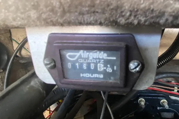 Slide: The Image of Hour meter reading 1608 on a 1998 Regal 2250 LSC boat. - 2