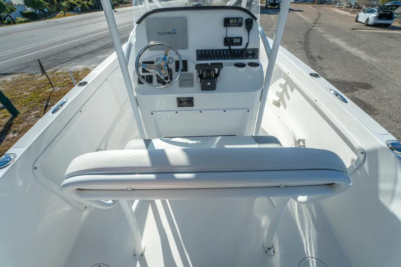 Slide: The Image of 2020 Twin Vee 240 GFX CC boat console with Garmin electronics and steering wheel. - 21
