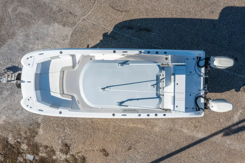 Slide: The Image of Overhead view of 2020 Twin Vee 240 GFX CC boat on gravel surface. - 4
