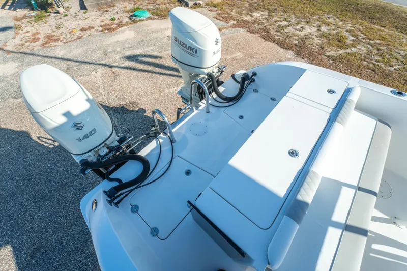 Slide: The Image of 2020 Twin Vee 240 GFX CC boat with dual Suzuki 140 outboard engines. - 41