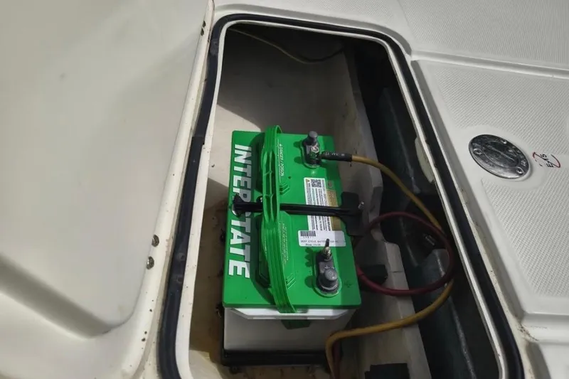 Slide: The Image of 2013 Spyder FX17 Flicker boat interior with steering console and seating. - 11