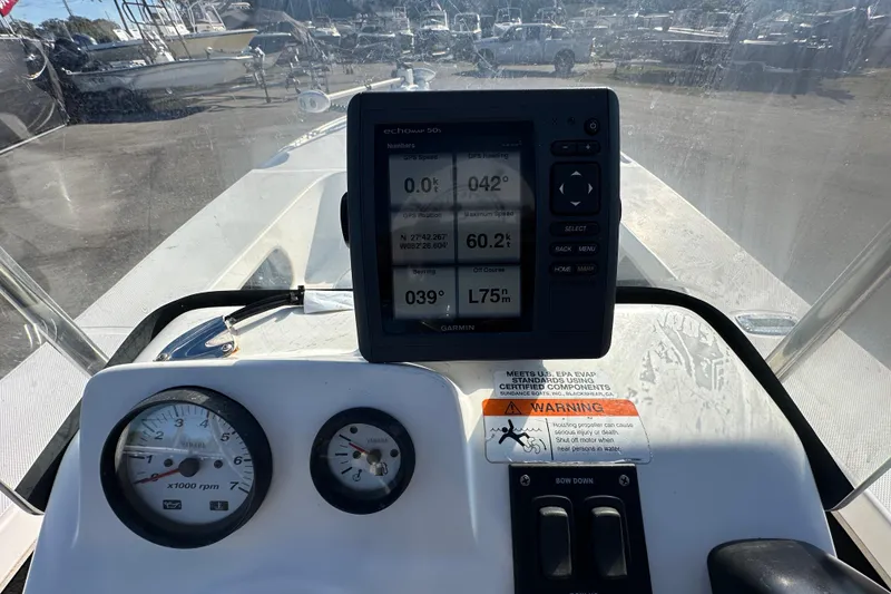 Slide: The Image of Dashboard of 2013 Spyder FX17 Flicker boat with GPS and gauges. - 16